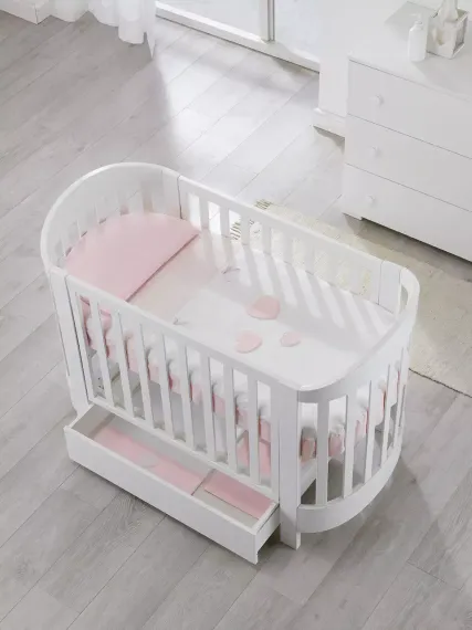 Детская кроватка на колесах Erbesi Ariel Ovale White
