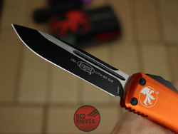 Нож Microtech UTX-85 S/E - оранжевая рукоять, стандартный клинок, черный + запчасти RK-395