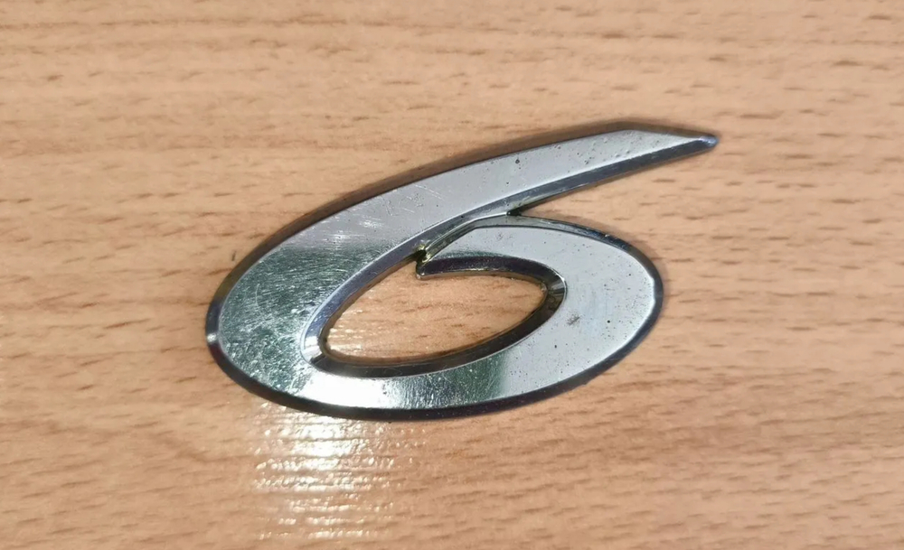 Эмблема логотип крышки багажника Mazda 6 gg - GJ6A51711 GJ6A51721