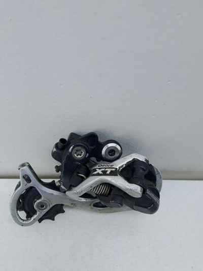 Переключатель на велосипед Shimano Deore XT RD-M771 (задний)