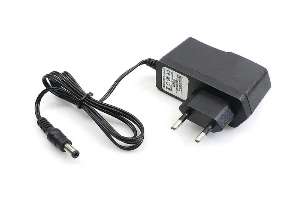 Блок питания (сетевой адаптер) универсальный 7.5V/1A (5,5*2,1 мм)