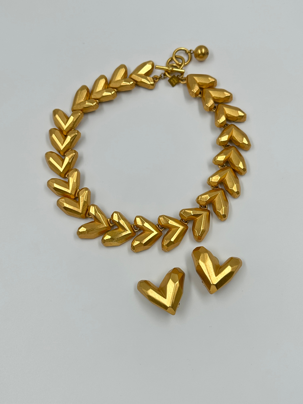 Комплект из клипс и колье Anne Klein