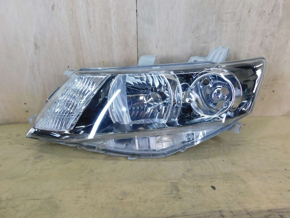фара левая Toyota Allion NZT260 ZRT265 20-447