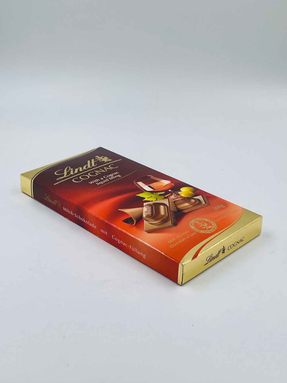 Молочный шоколад Lindt Cognac-Füllung Коньячный ликер 100 г (Германия)