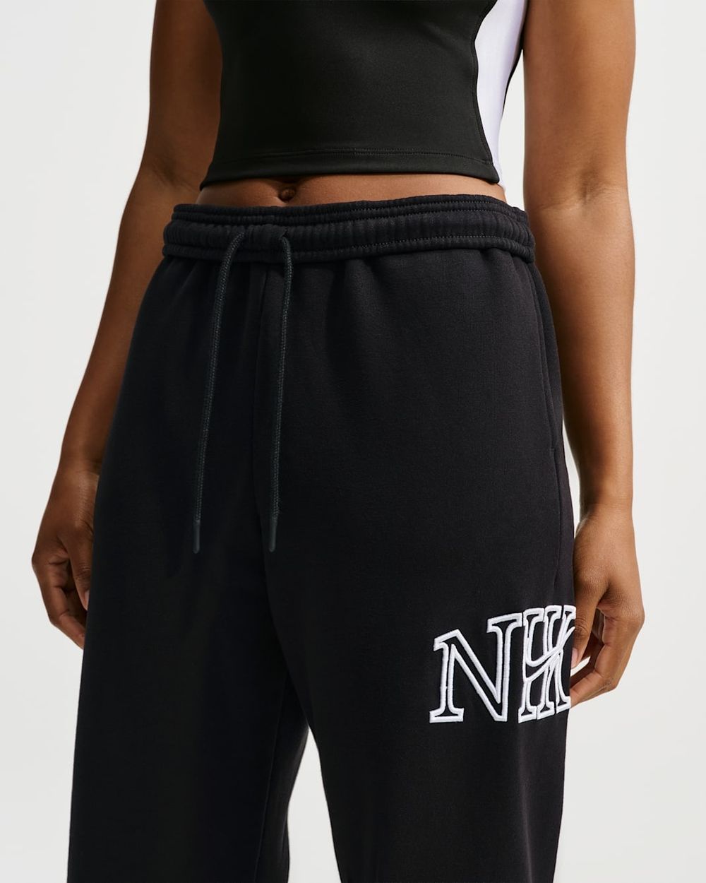 Брюки спортивные женские NIKE W NK STDO FLC MW OS LGO CF PNT