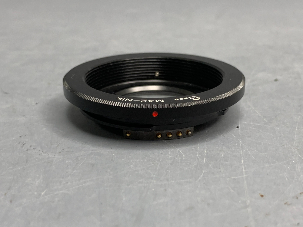 Переходник (адаптер) М42 - Nikon с линзой