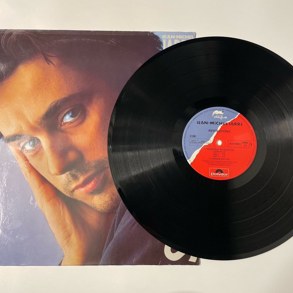 Винтажная виниловая пластинка LP Jean Michel Jarre Revolutions (Германия 1988)