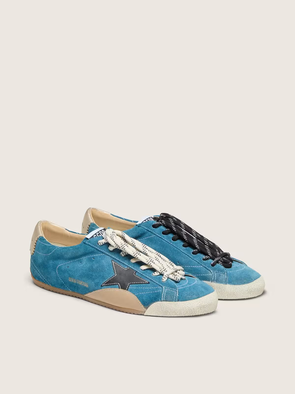 True Star of suede in steel blue with black star and cream heel tab