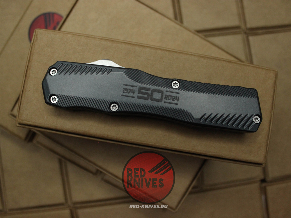 Нож Kershaw Livewire 9000 - серая рукоять, клинок сатин , 50 лет