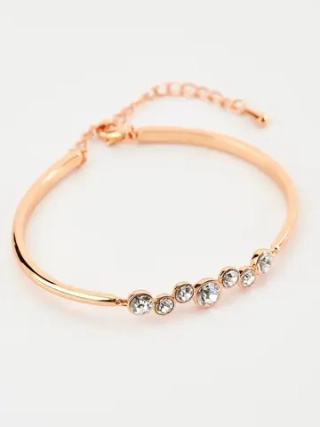 Жесткий браслет Эльза с белыми камнями Swarovski
