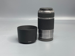 Sony 55-210mm f/4.5-6.3 E OSS микроточки внутри линзы
