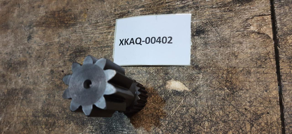 Вал-шестерня редуктора хода XKAQ-00402