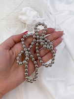 Серьги из бусин серебро бантики