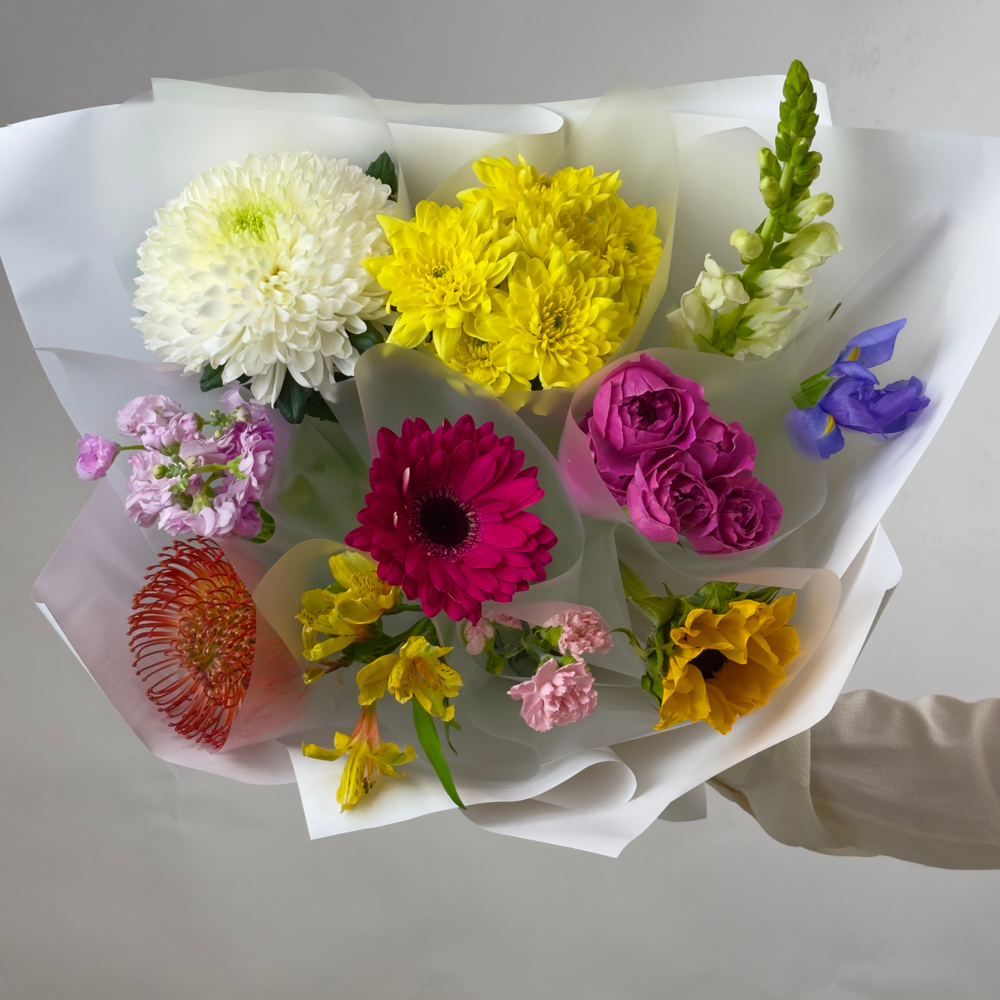 Flower bouquet of 11 Russian multi-colored roses