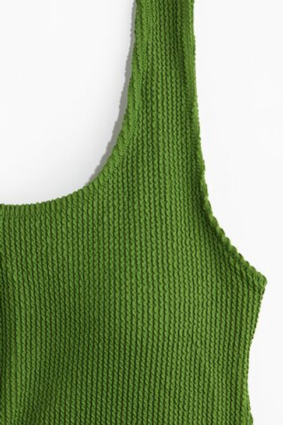 Купальник с чашками и глубоким вырезом - H&M