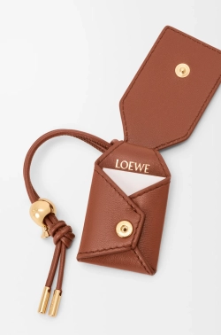 Loewe Сумка-мешок среднего размера Puzzle Featherlight из кожи ягненка наппа, коричневый