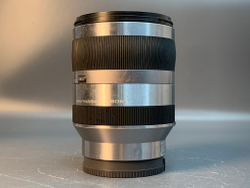 Sony 18-200mm OSS , сколы на пластмассе передней линзы