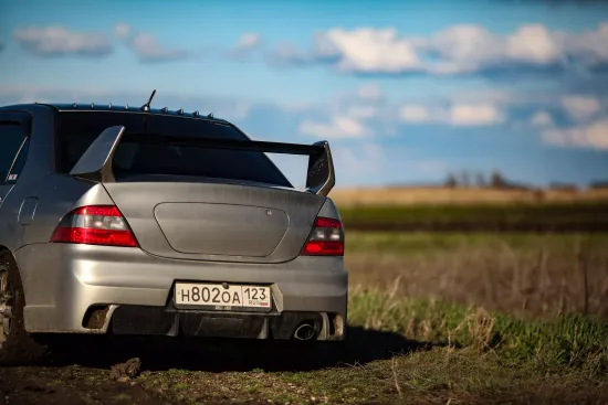 Задний бампер в стиле Evo для Mitsubishi Lancer 9