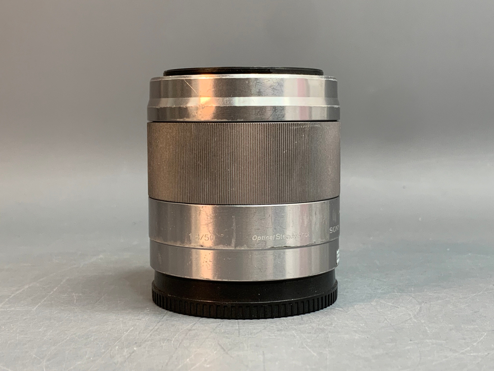 Sony 50mm 1.8 OSS внутри пыль