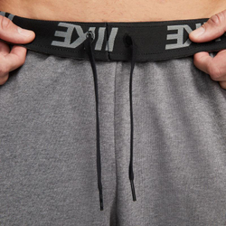 Мужские теннисные штаны Nike Dry Pant Taper FA Swoosh - charcoal heather/white