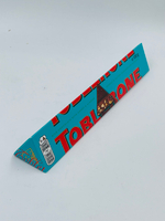 Toblerone молочный шоколад Crunchy Almond соленая карамель, нуга, миндаль 100 г (Швейцария)
