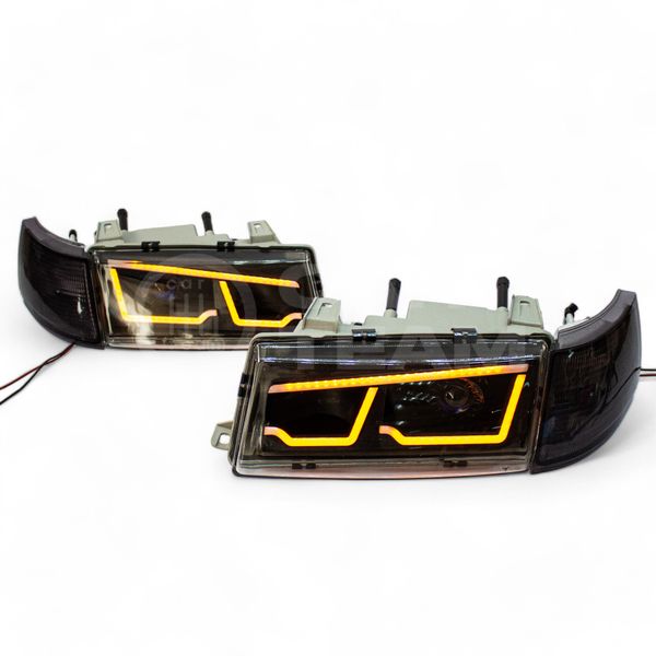 Фары ВАЗ 2110, 2111, 2112 передние в стиле BMW с Bi LED модулями 1,8 дюйма, белые галочки (тонированные поворотники)