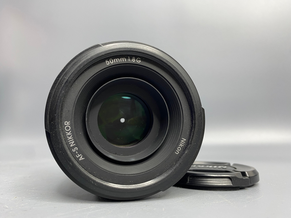 Nikon 50mm 1.8G пылинки