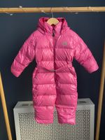 Пуховой комбинезон Moncler