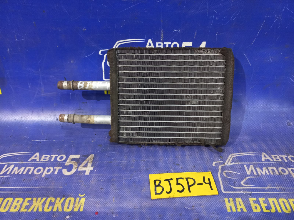 Радиатор печки MAZDA FAMILIA 2000