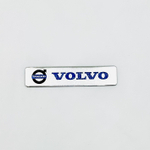 Наклейка Volvo с лого объемная полиурентан (шильдик Вольво, 12х2,5см). Серебристая с синей надписью и лого