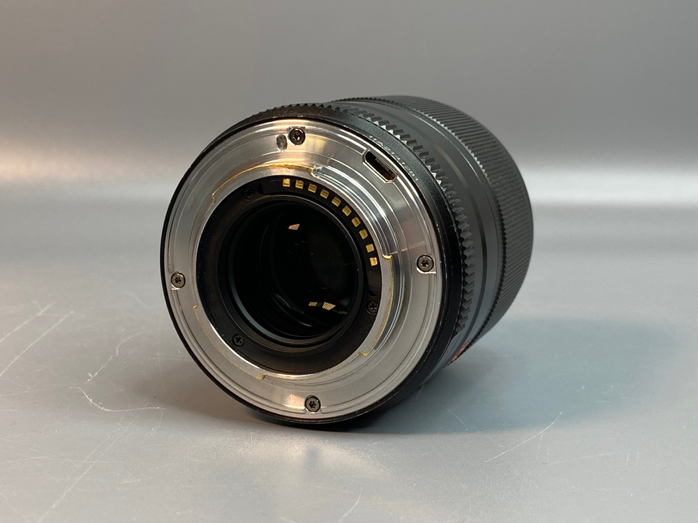 Viltrox 56mm 1.4 STM Fujifilm X пылинки внутри линзы