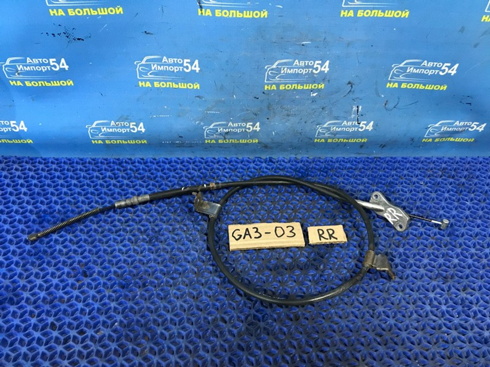 Трос ручника правый Honda LOGO 2000