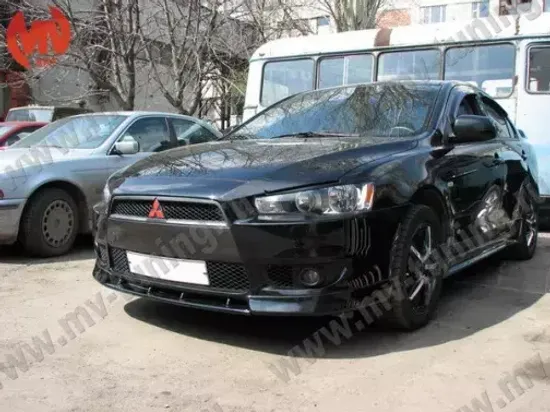 Зубатка между передними клыками для Mitsubishi Lancer 10