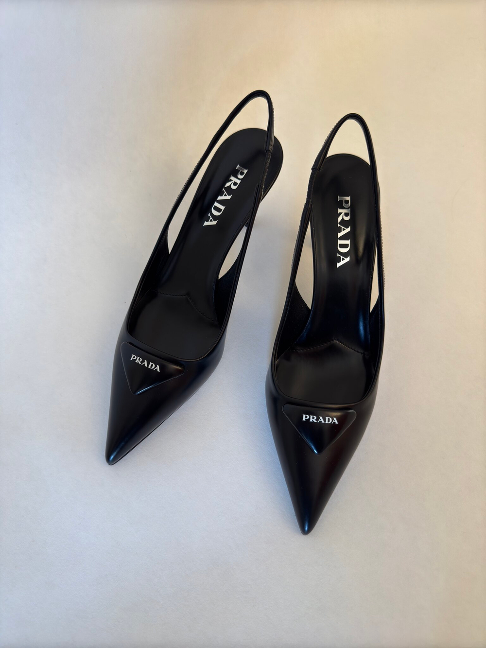 Слингбэки Prada