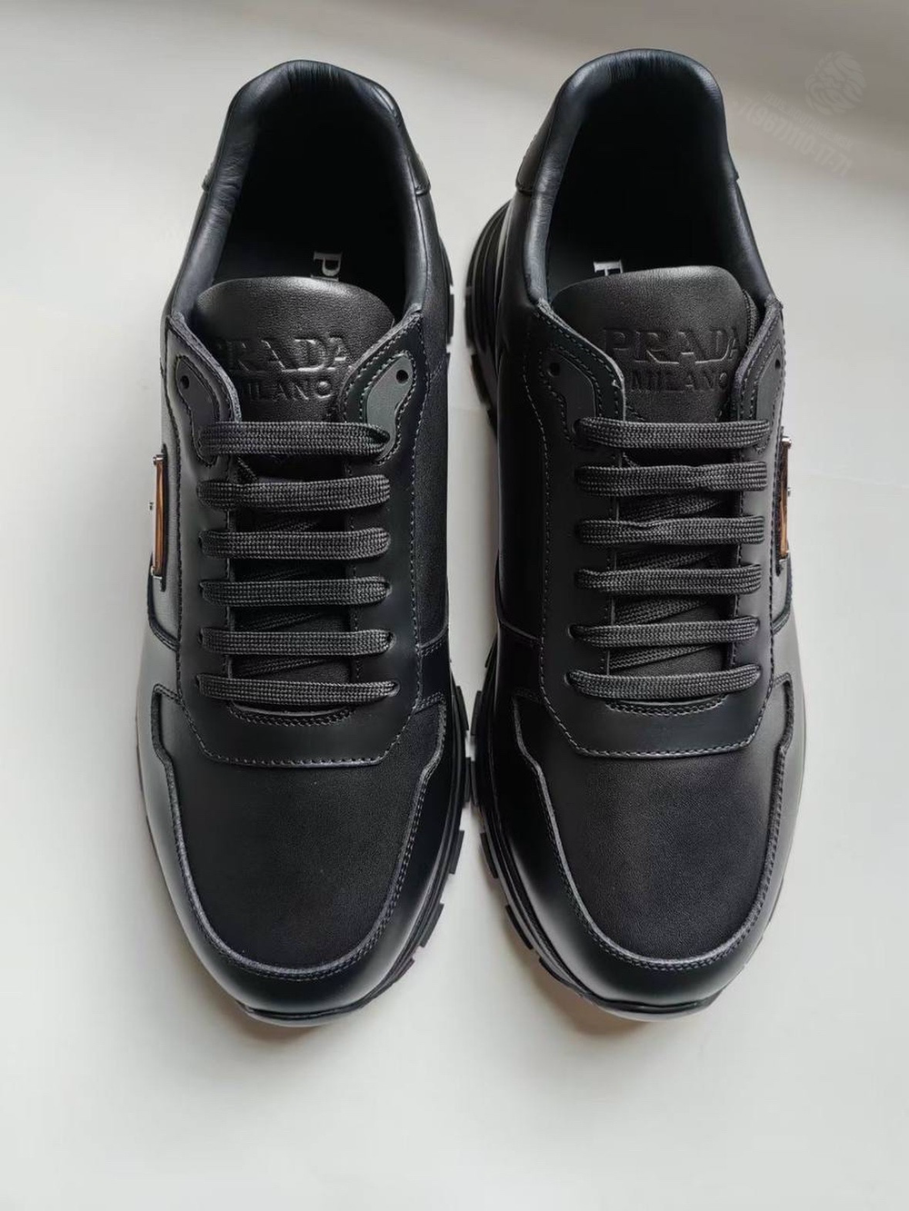 Кроссовки Prada