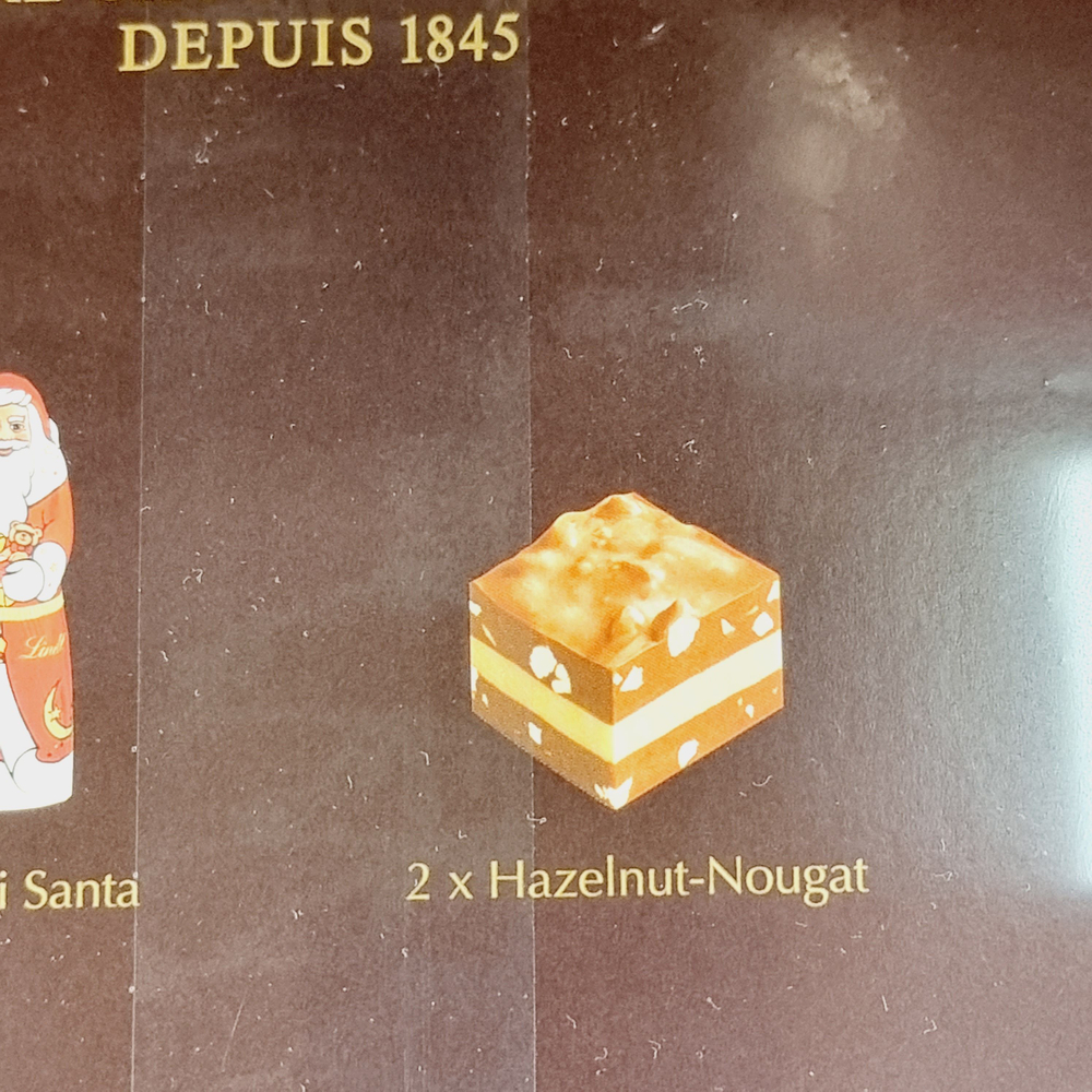 Адвент-календарь Lindt Christmas tradition с шоколадными конфетами ассорти 253 г (Из Финляндии)