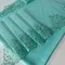 Вышивка на сетке ментол 20 см (правая)