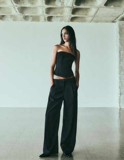 Женские брюки в полоску с защипами - BERSHKA