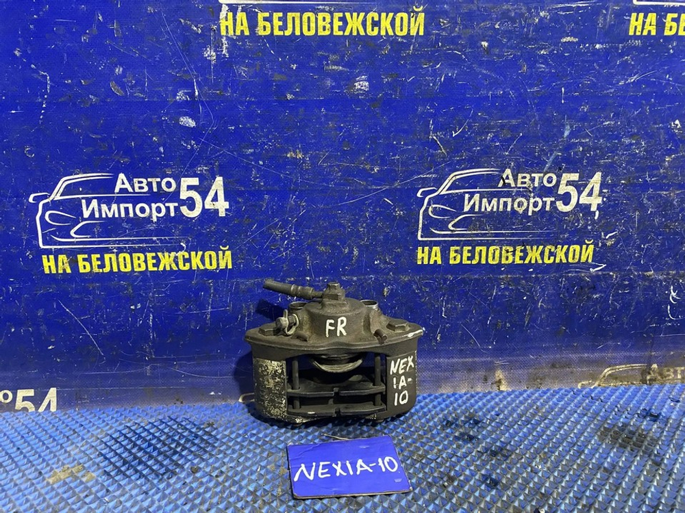 Суппорт тормозной передний правый DAEWOO NEXIA 1997