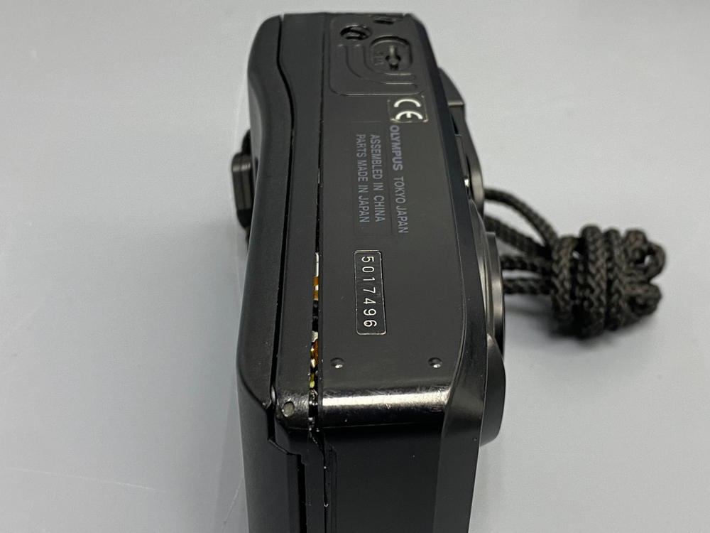 Olympus SuperZoom 105 мажет мимо пленки