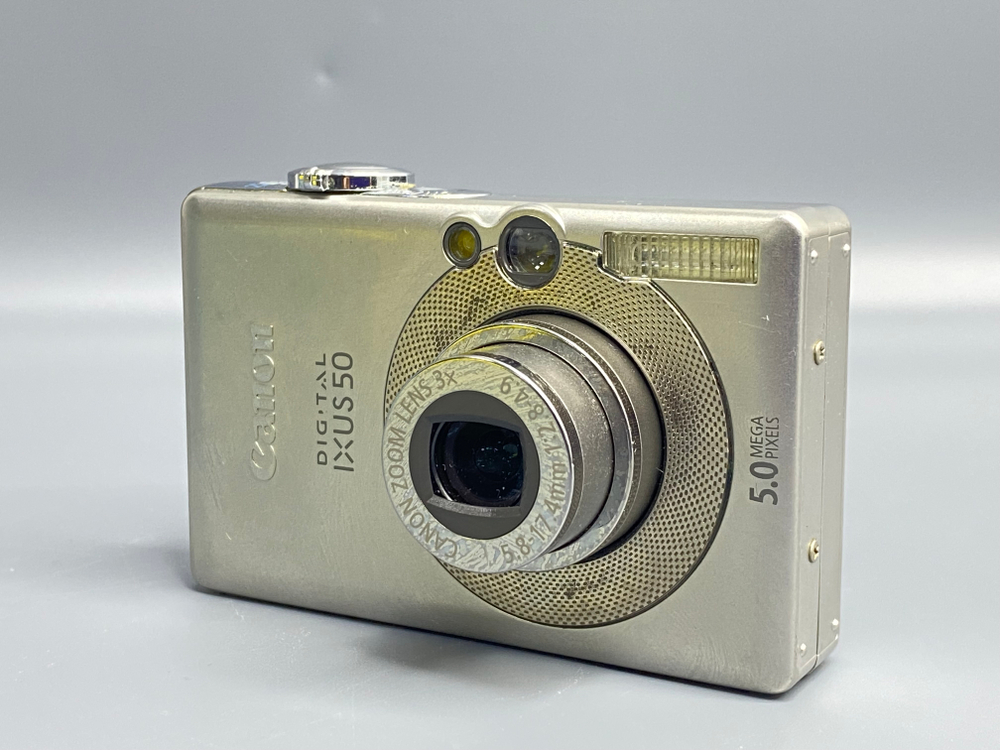 Canon IXUS 50 — не работает отдаление