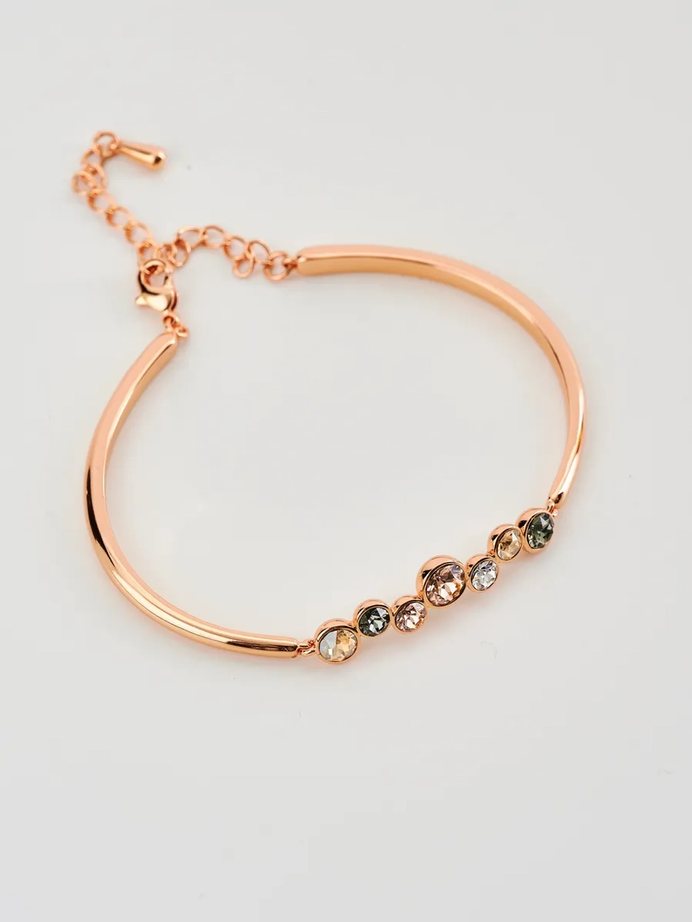 Жесткий браслет Эльза с камнями Swarovski шампань