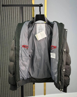 Мужской пуховик Brunello Cucinelli цвета хаки с трикотажным капюшоном