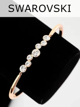 Жесткий браслет Эльза с белыми камнями Swarovski
