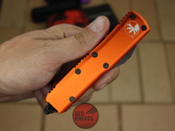 Нож Microtech UTX-85 S/E - оранжевая рукоять, стандартный клинок, сатин + запчасти RK-393