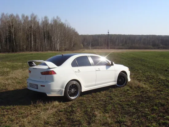 Юбка заднего бампера var.1 Zodiak для Mitsubishi Lancer 10