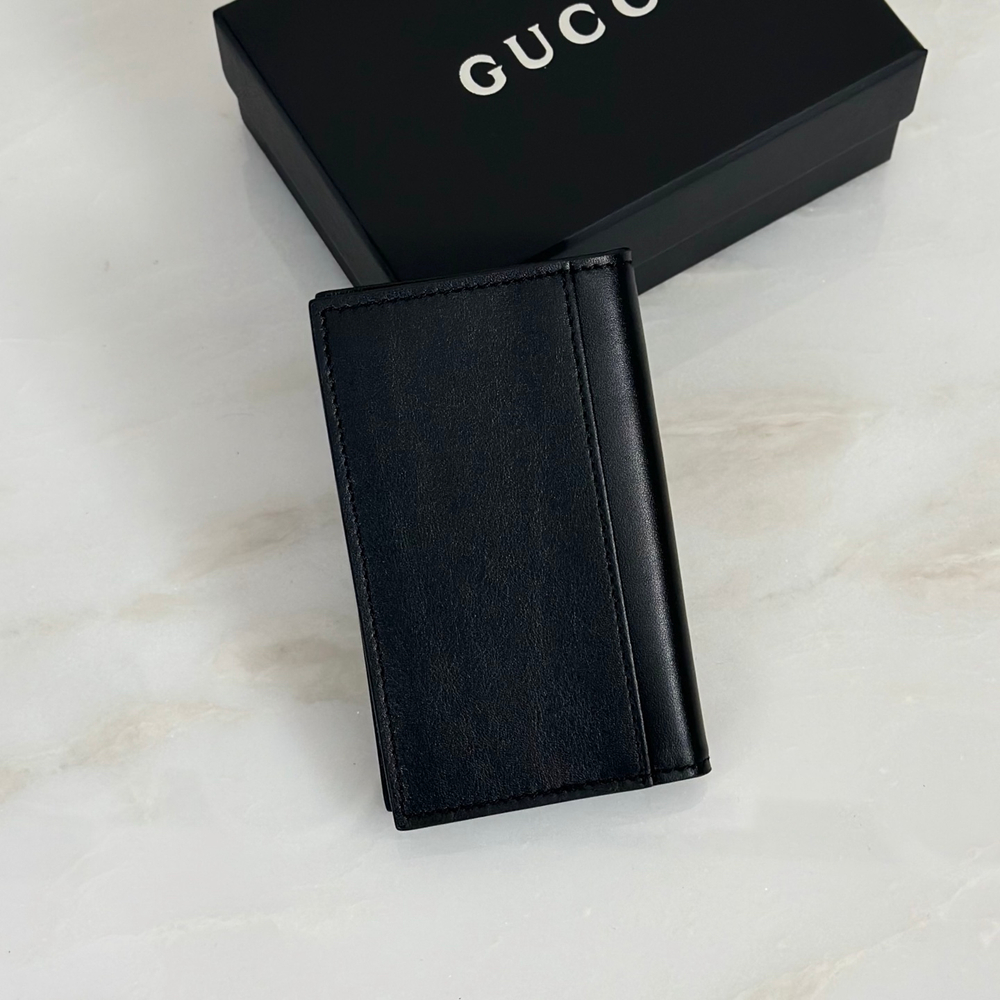 Мужской картхолдер Gucci складной с чёрной отделкой GG — чёрный — фото 2