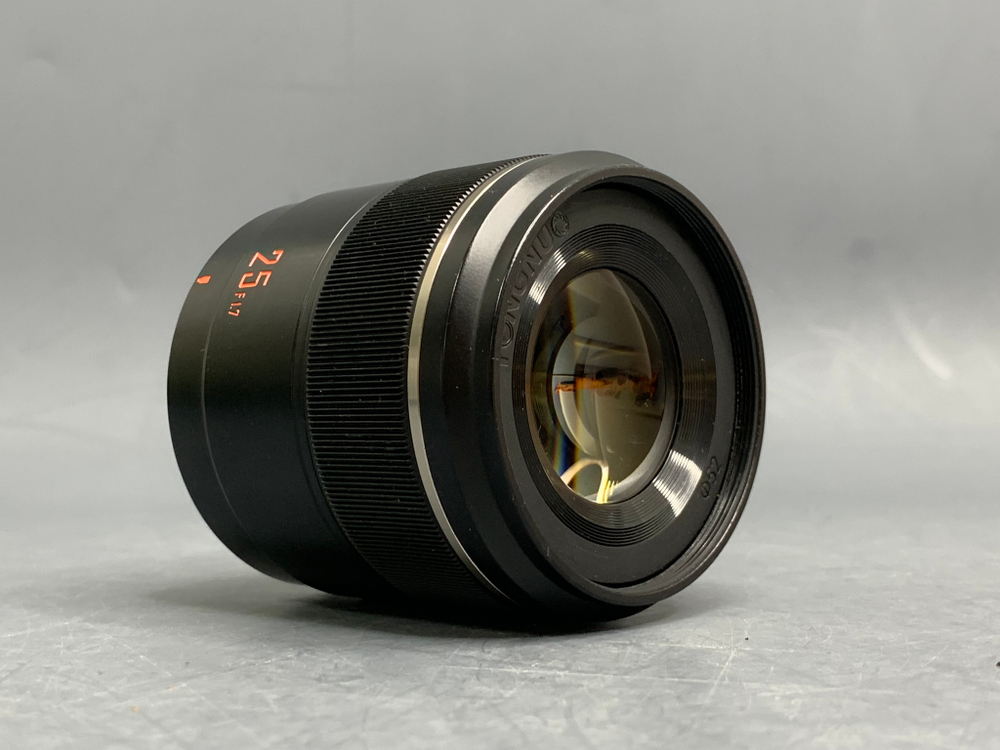 YongNuo 25mm 1.7 MFT Внутри линз разводы