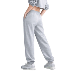 Женские теннисные брюки Nike Sportswear Phoenix Fleece - dark grey heather/sail