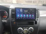 Магнитола для Nissan Tiida C11 2004-2013 (климат с круглым экранчиком, рамка черная) - FarCar S280 монитор 9.5" IPS на Android 13, CarPlay